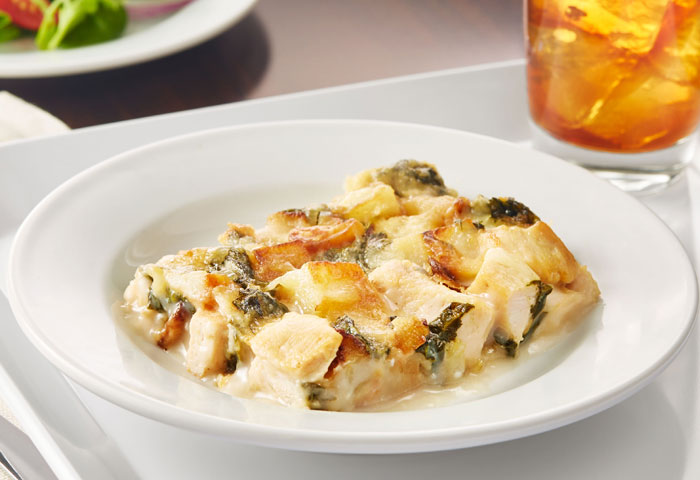 Healthy Potato, Braised Greens, & Chicken Bake with High Protein Cheese Sauce